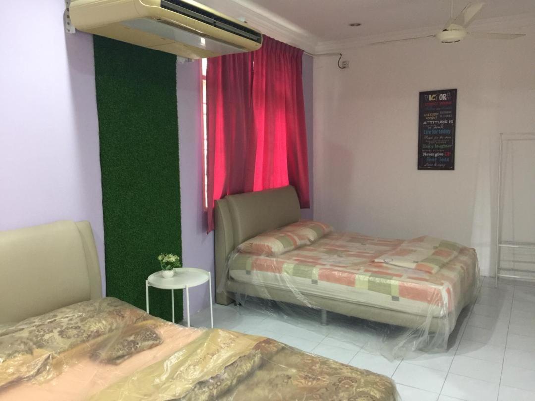 The Garden Vacation Home Lumut Luaran gambar